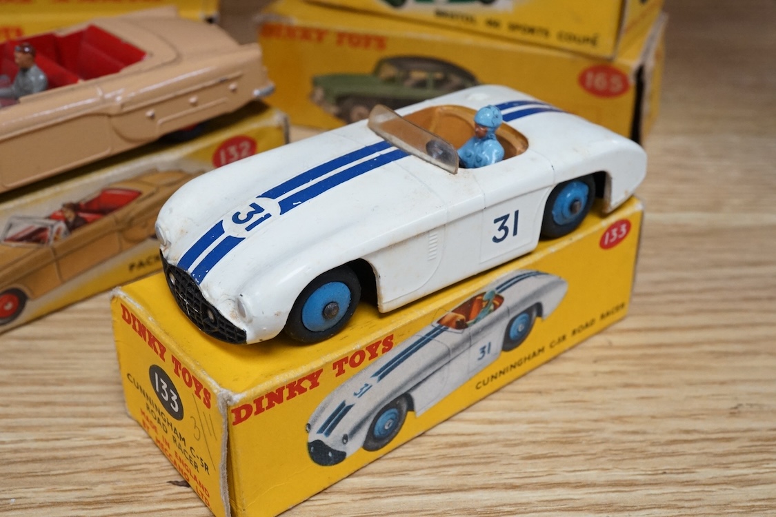 Six boxed Dinky Toys cars; Cunningham C-5R (133), Jaguar 3.4 saloon (195) in grey, Packard convertible (132) in fawn, Jaguar XK120 (157) in dark red (in a reproduction box), Humber Hawk (165) in two-tone green and black,